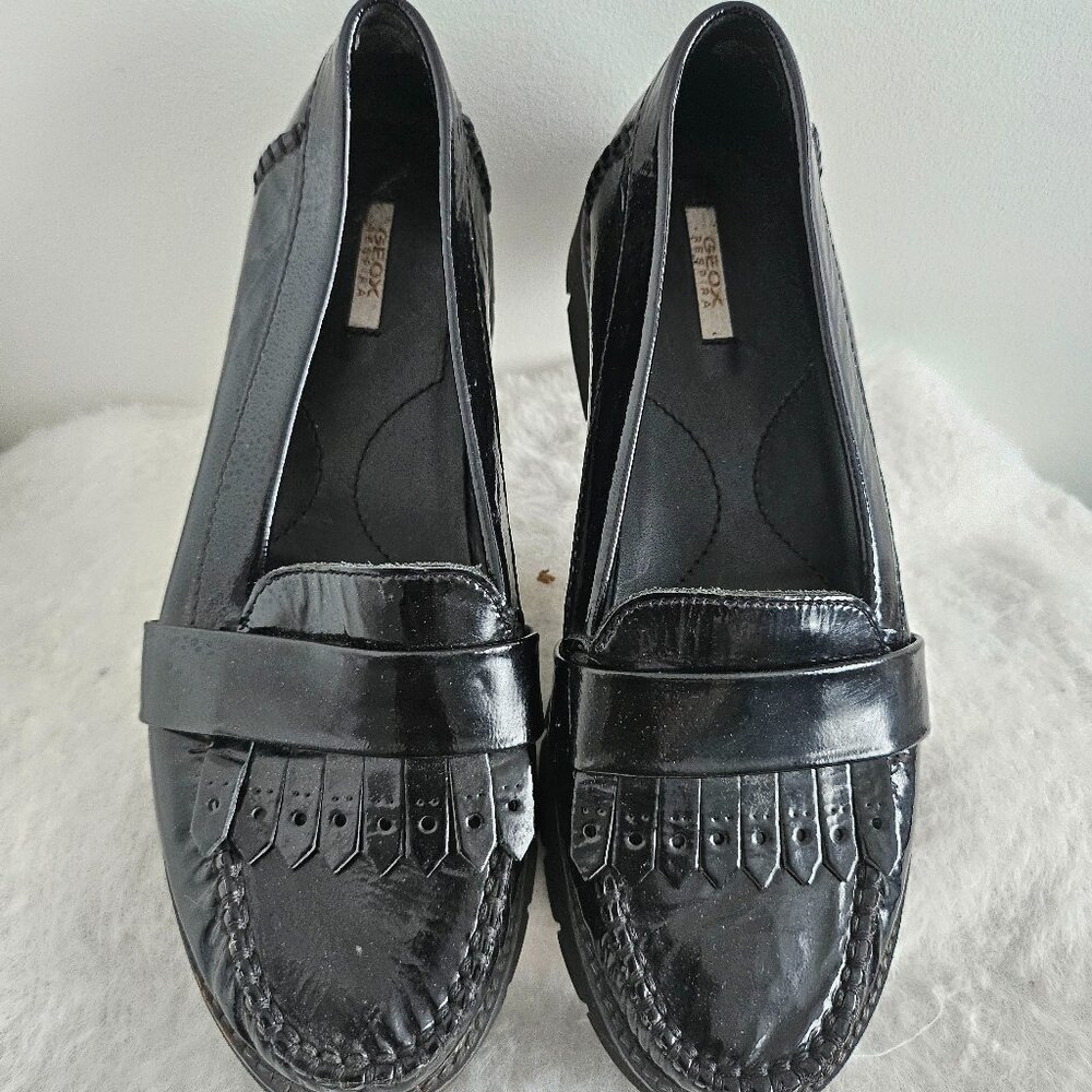Mocassins en cuir vernis et franges Geox